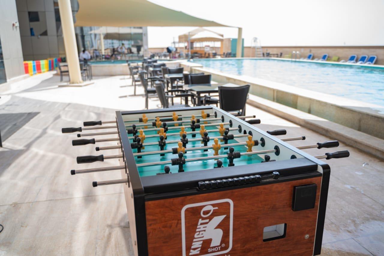 Luxe Grand Hotel Apartments Шарджа Экстерьер фото A foosball table