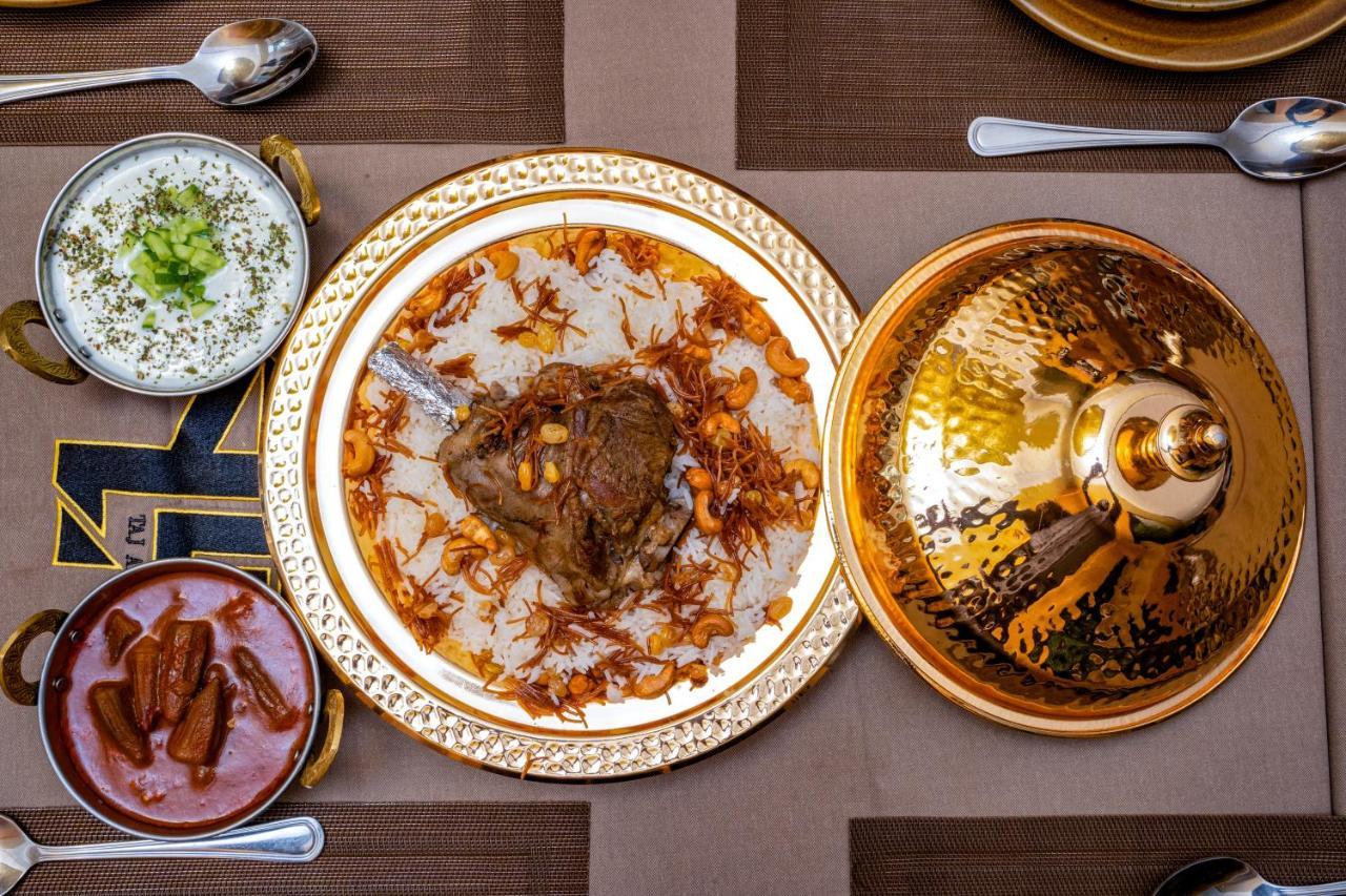Luxe Grand Hotel Apartments Шарджа Экстерьер фото Hyderabadi biryani