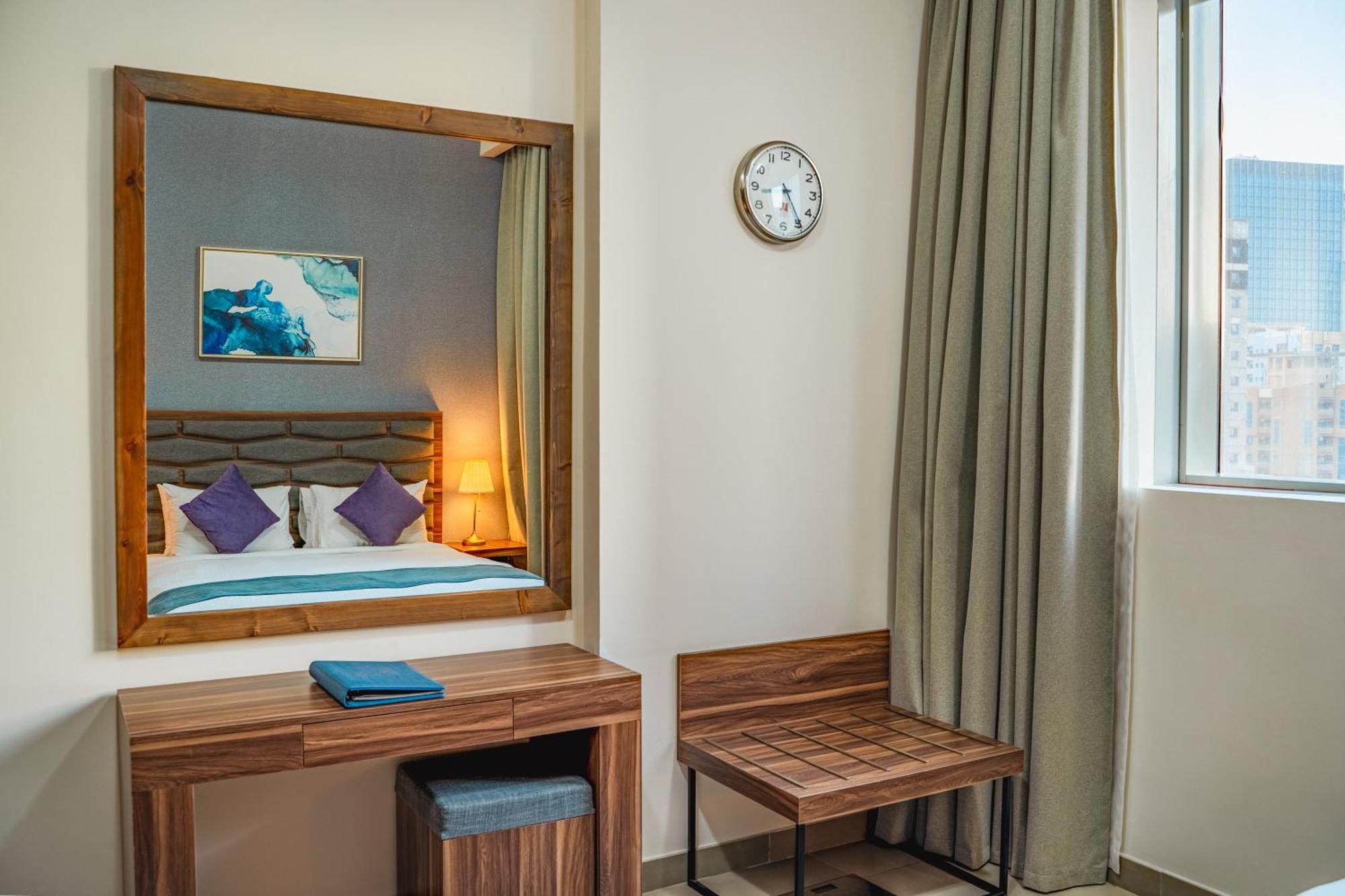 Luxe Grand Hotel Apartments Шарджа Номер фото A bedroom at the hotel